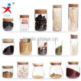 Different Volumes Glass Jars With Wood or Bamboo Covering thumbnail-1