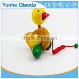 Colorful Pull Along Duck Wooden Toy as You Pull They Make a a Fun Baby thumbnail-2