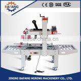 FXJ-6050 Top & Bottom Drive Automatic Strapping Machine thumbnail-1