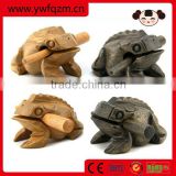 carved wooden frog toy