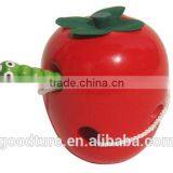 Wooden Caterpillar Eating Red Apple thumbnail-1