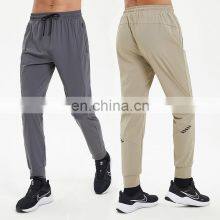 Good Quality Stretch Quick Dry Elastic Drawstring Zipper Side Pocket Men's Jogging Pants Workout Casual Sports Fitness Gym Wear thumbnail-1