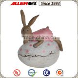 5.5" pink dress bunny rabbit lying on Easter egg resin craft, decorative easter rabbits