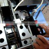 CO-900 Multifunction Label / Fabric Cutting and Folding Machine thumbnail-1