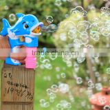 Battery operated blowing dolphin shaped bubble gun toy
