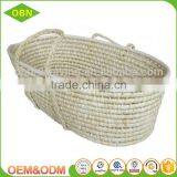 High-end Customized Corn Husk Straw Baby Mose Basket With Braided Handles thumbnail-2