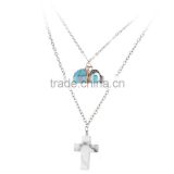 Double chain cross pendant turquoise and hamsa hand charms necklace