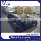 China Foshan NaiGu Manufacturer 2016 Semi-automatic Mattress Roll Packaging Machine thumbnail-5