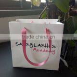 Custom White Cardboard Packaging Bags for Garments thumbnail-1