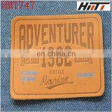 Garment Faux Print and Embossed Leather Label