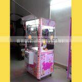 Best selling coin operated claw crane machine / toy vending machine / doll grabbing machine