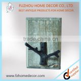 antique metal hook with wooden frame for wall decoration