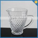 clear glass water pitcher with rhombus design