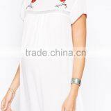 Maternity Embroidered Swing Dress With Dipped Hem China Supplier thumbnail-3