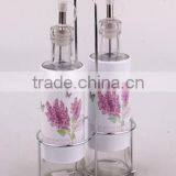 Glass Bottle Set With Nice Decal in a Metal Stand