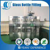 Машина для наполнения стеклянных бутылок с алюминиевыми отрывными крышками водой thumbnail-1