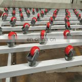 Glass transfer table with universal wheels, glass conveyor