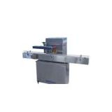 Continuous induction sealing machine