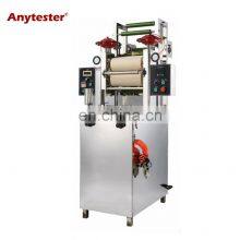 Лабораторная машина для крашения пряжи. Мини-машина для крашения, используемая в лаборатории для изготовления образцов