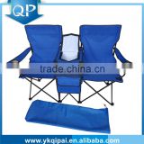 Two-seat folding chair with cup holder and cooler bag