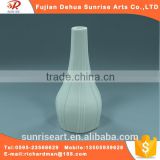 White ceramic vase used for flower arranging