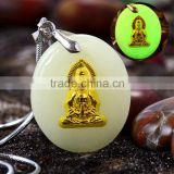 Gold plated Buddha or Guanyin pendant green light luminous stone necklace manafacturer from China