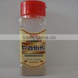 white pepper powder in small condiment containers