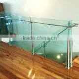 Topless glass rails with stainless steel handrail