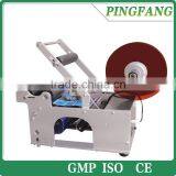 MT-50 Simplest and Cheapest Price Semi Automatic Round Glass Plastic Bottle Adhesive Stick Labeling Machine thumbnail-2