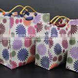 PP Laminated Jute Tote Bag With Wooden Eye Shape Cane Handle - Exclusive Printed Design thumbnail-2