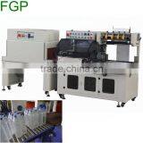 Automatic cutting heat shrink wrapping machine for book or box