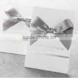 Elegant & Romantic White Pocket Fold Wedding Invitation With Silver Bow & Silver Border thumbnail-1