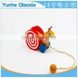 Colorful Pull Along Snail Wooden Toy as You Pull They Make a a Fun Baby thumbnail-2