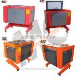 MC 6040 Desktop CO2 CNC Wood Wine Bottle Laser Engraving Machine With Rotary thumbnail-1