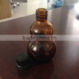 Unique Shaped Amber Boston Round Glass Bottles thumbnail-2