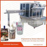 New High Quality Stand up Spouted Pouch Filling Capping Packing Machine Factory