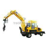 Excavator With Auger