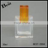 China Promotion Cosmetic Clear Square Mold Fragrance Perfume Glass Bottle 30ml With Orange Long Rectangle Cap