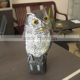Electric owl decoy for garden protection