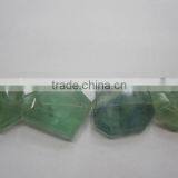 Wholesale fluorite Tumbled flat loosen faceted gemstone manufacturer