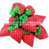 Reusable Shopping Tote Bag - Folded Into a Strawberry