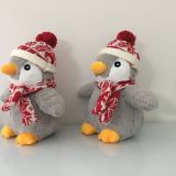 Plush toy penguin with hat scarf