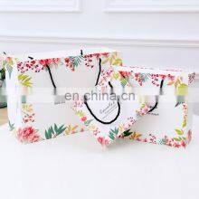 Wholesale Custom Logo Design Luxury Printing Clothing Boutique Shopping Paper Bag Jewellery Gift Packaging Bag With Handle