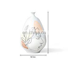 Modern Nordic Desigh Abstract Face Porcelain Ceramic Flower Vase For Home Decor thumbnail-4