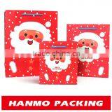 Cute Father Christmas Printing Coated Paper Gift Bag With Handle Wholesale thumbnail-1