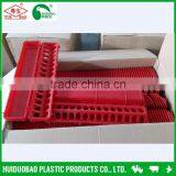 Chicken use plastic long feeding troughs with holes