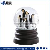 Resin penguin figurines snow globe
