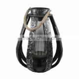 antique iron lantern with glass tube