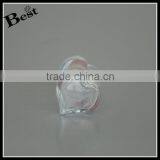 China 100ml Cosmetic Perfume Glass Bottle With Silver Aluminum Lid Heart Shaped Bottom Bottle Glass Best Selling thumbnail-2