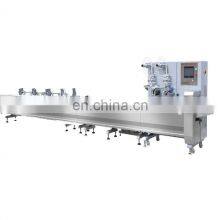 Nine Servo Control Energy Bar Protein Bar Chikki, Cake, Gajak, Peanut Bar, Burfi Packing Machine Flow Wrapping Machine